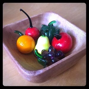 Tiny glass fruits in a bowl